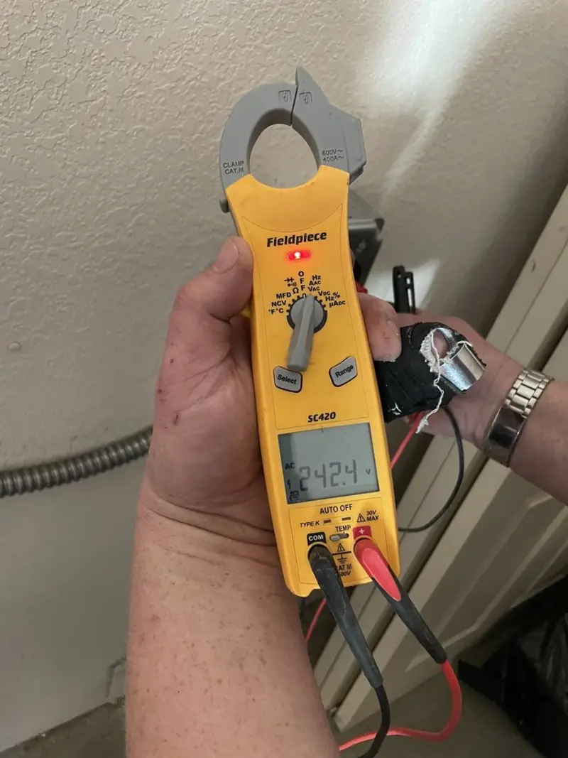 Voltage testing with clamp meter during Circuit Breaker Repair in Brookville